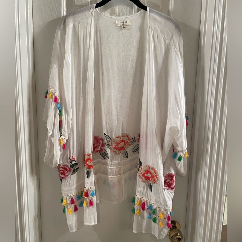 White cotton open jacket with colorful embroidery and trim by Umgee